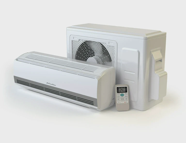 biała klimatyzacja zewnętrzna i&nbsp;wewnętrzna oraz&nbsp;pilot